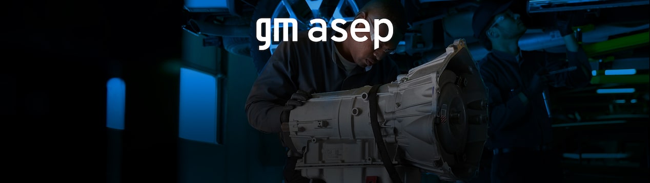 Certified Service Technician Inspecting a Transmission with Overlay of GM ASEP Logo