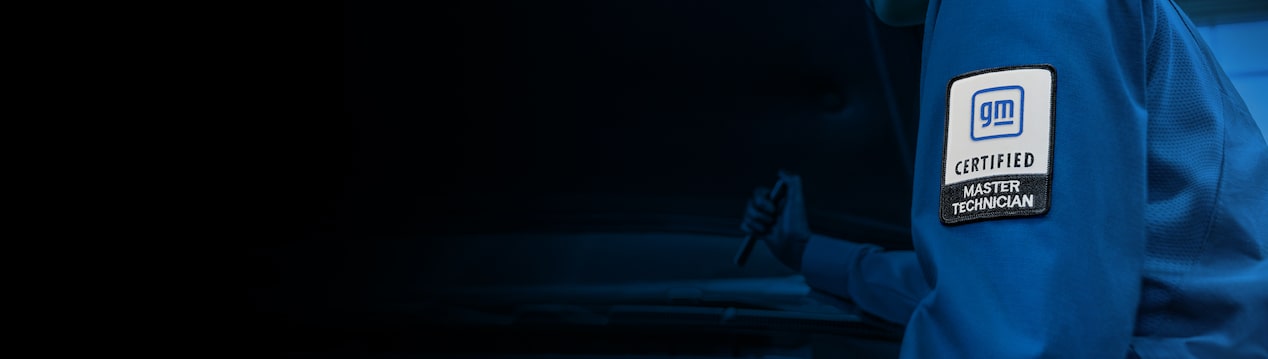 GM Certified Master Technician Inspecting a Vehicle