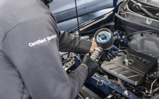 Man holding tool in hand