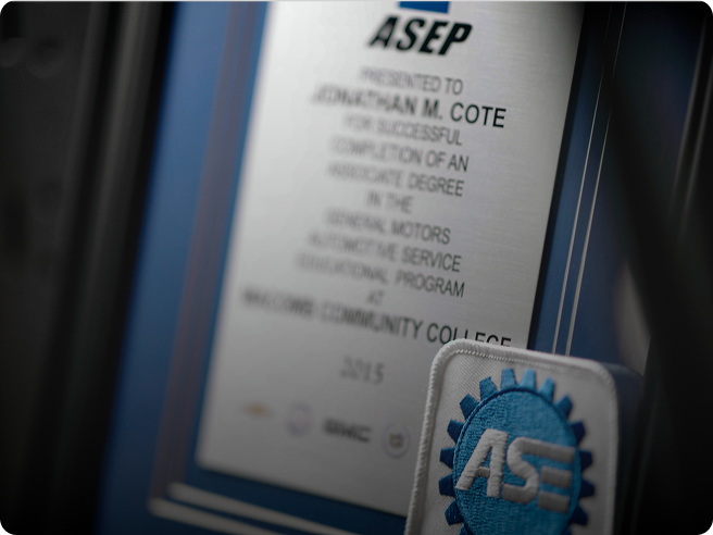 GM Automotive Technician Educational Degree with Slight Blur and Soft Lighting