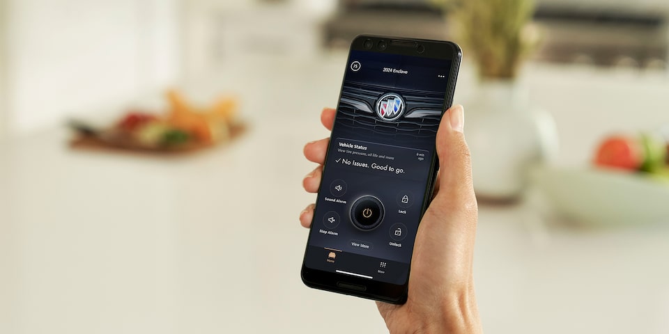 A Customer Using the myBuick Mobile App on a Smartphone