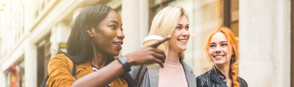 Women Shopping Using Their My GM Rewards Master Card