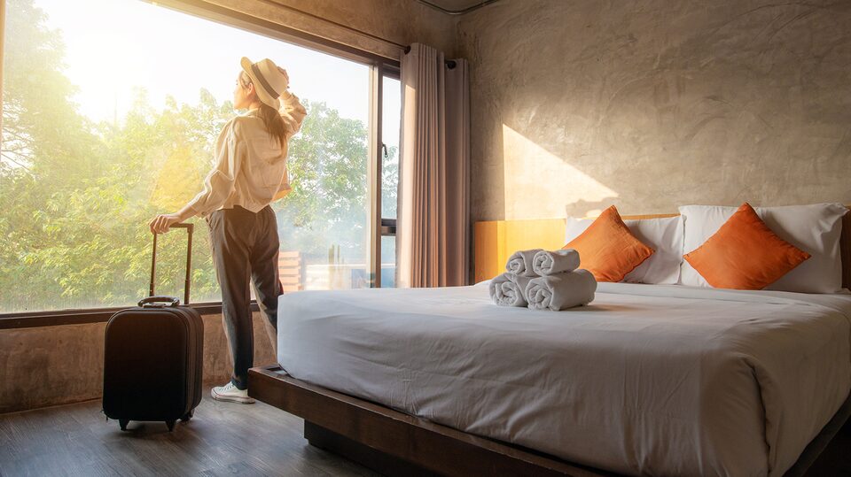Woman Booking a Hotel Room Using My GM Rewards