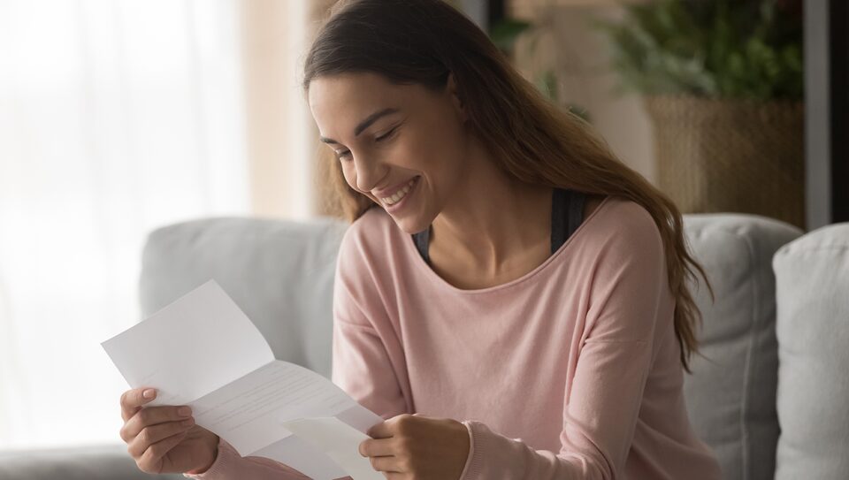 Woman Viewing Her GM Extended Family Card Statement