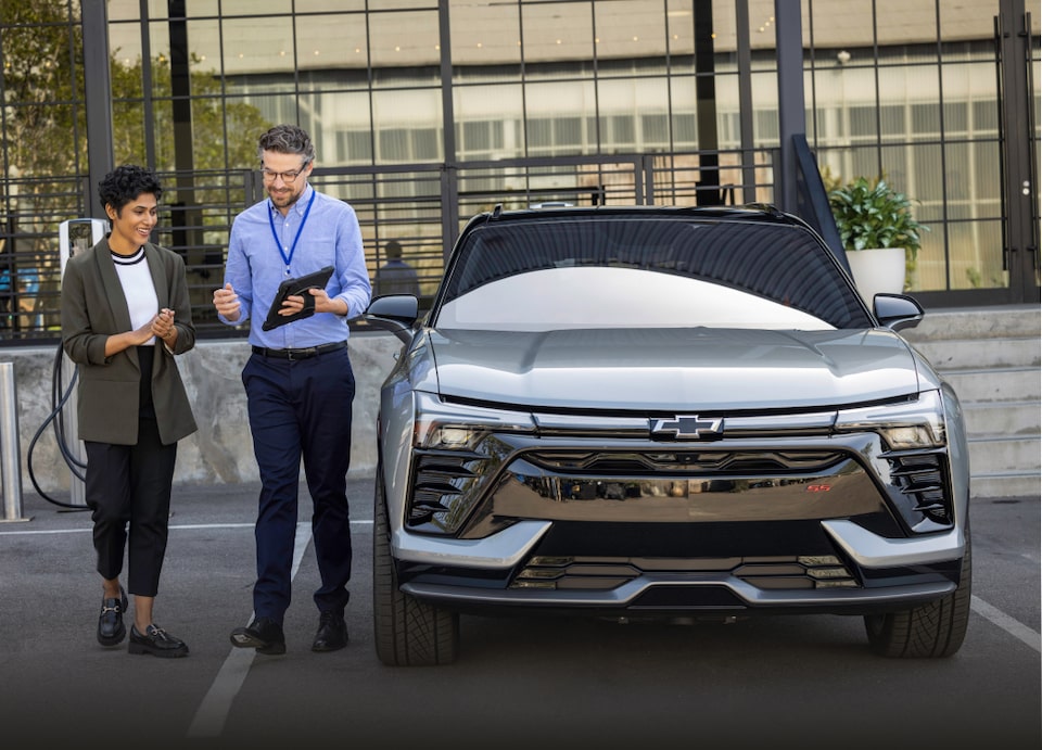 Chevy Employee Discussing Allowance with Customer