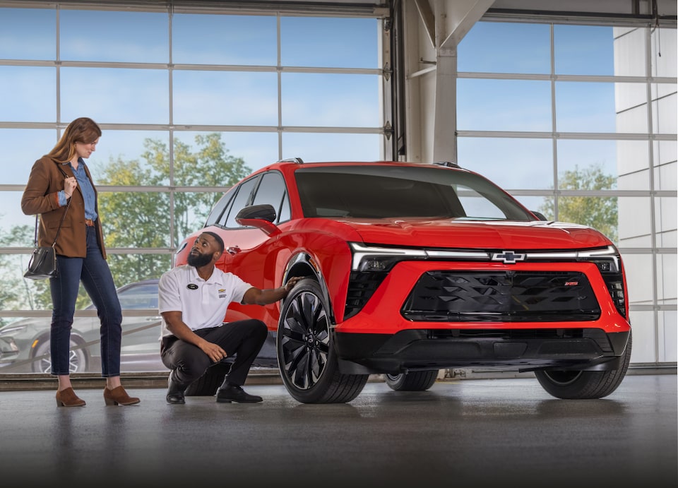 Woman shopping for a new Chevrolet EV