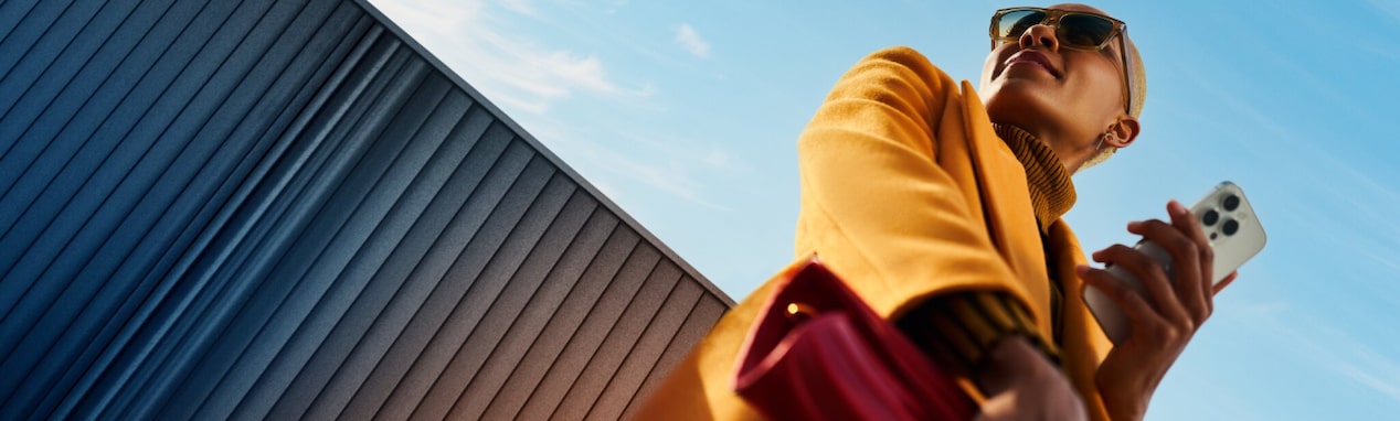 Close up of a woman holding her phone