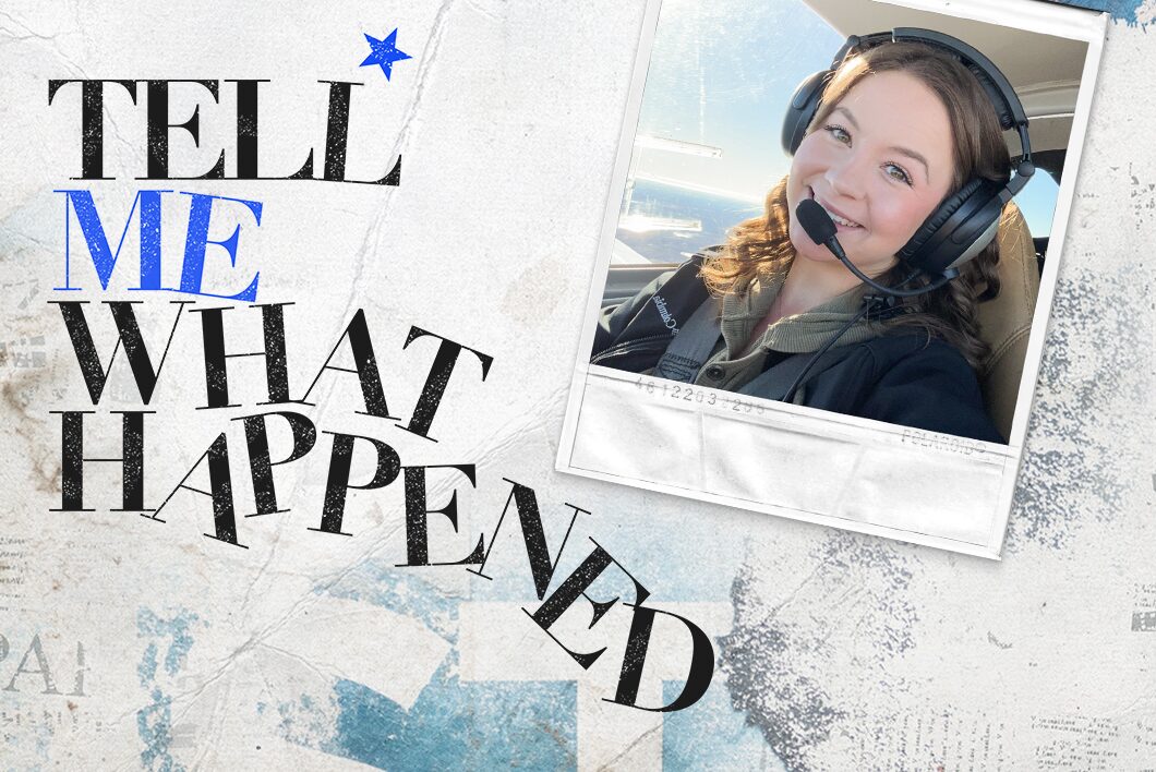 A woman taking a photo while piloting a plane on sunny day next to the text overlay of "Tell Me What Happened".