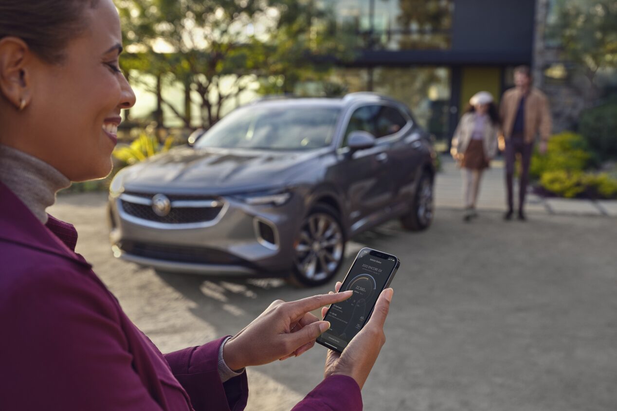 Woman Using Vehicle Mobile App on Smartphone