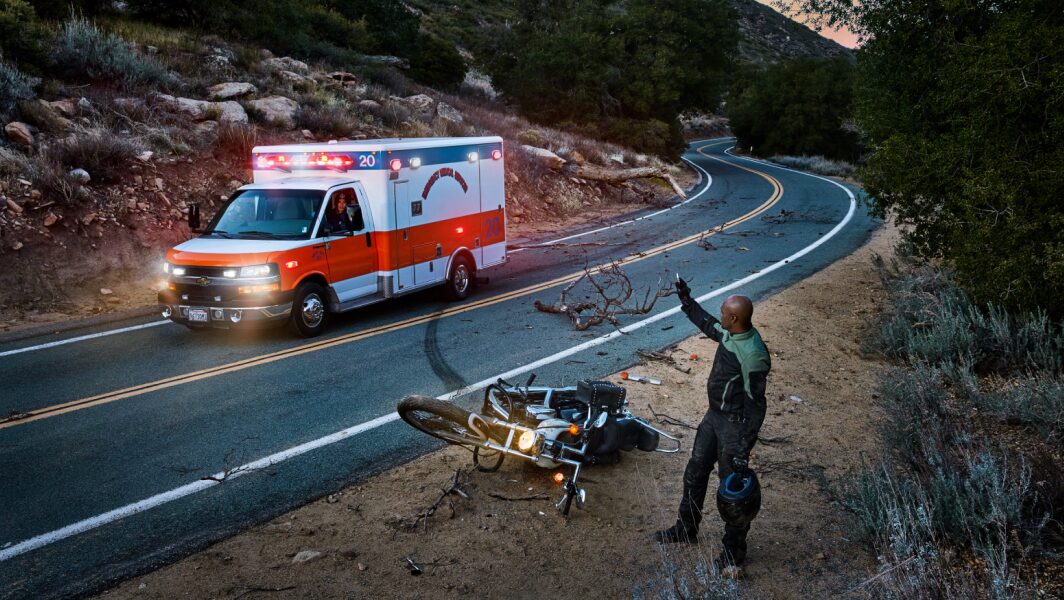 Motorcycle Side of Road with Ambulance