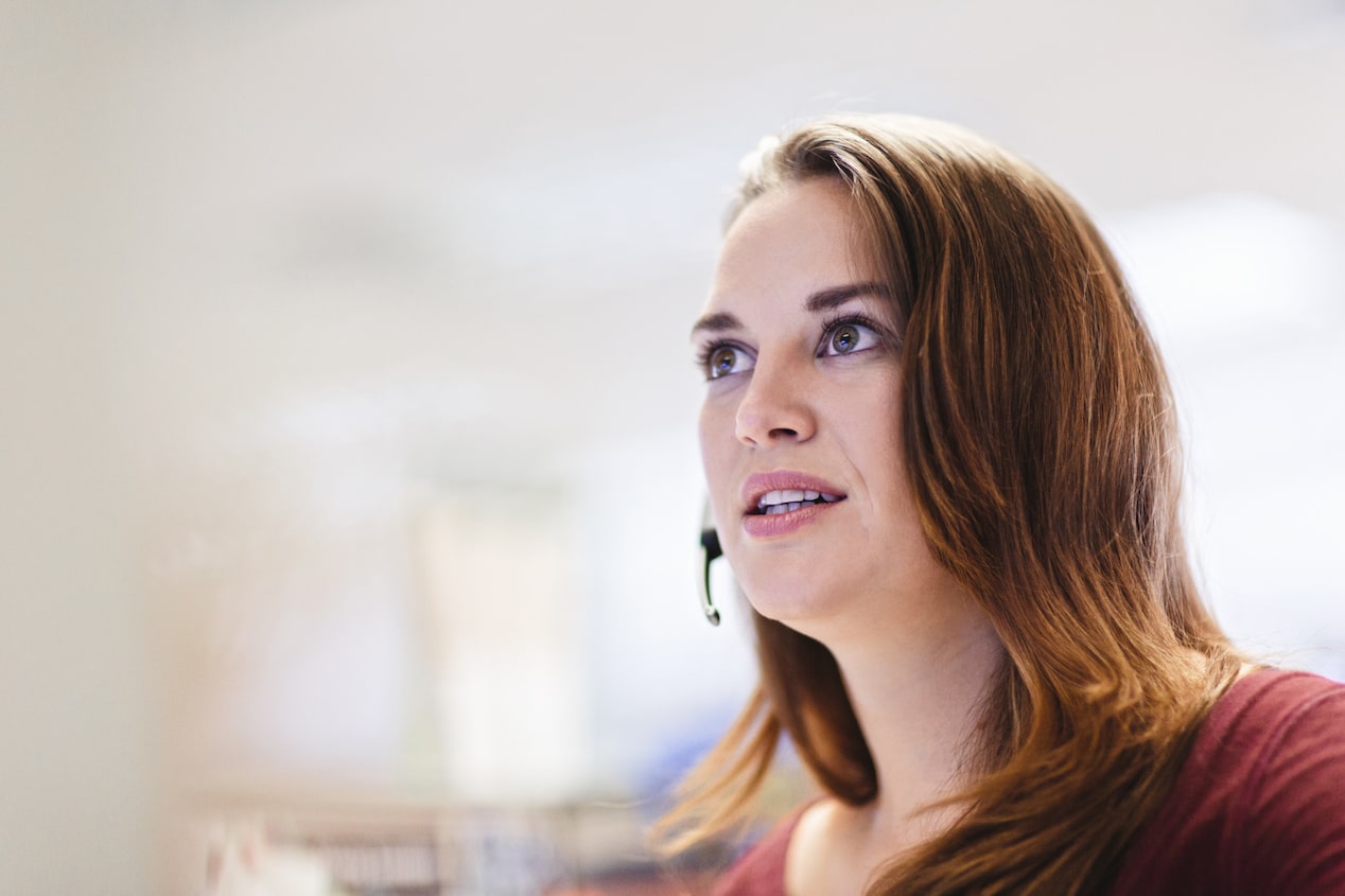 Upward View of OnStar Advisor With Headset on