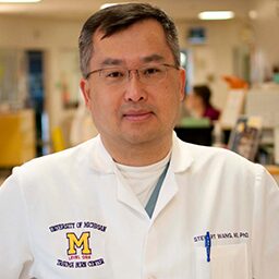University of Michigan Doctor Lightly Smiling at Camera