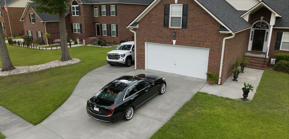 Barbara's Cadillac CT6 with Super Cruise tech parked in her driveway