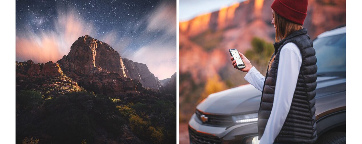 Woman Using Smartphone Next to Vehicle with Mountains in the Distance