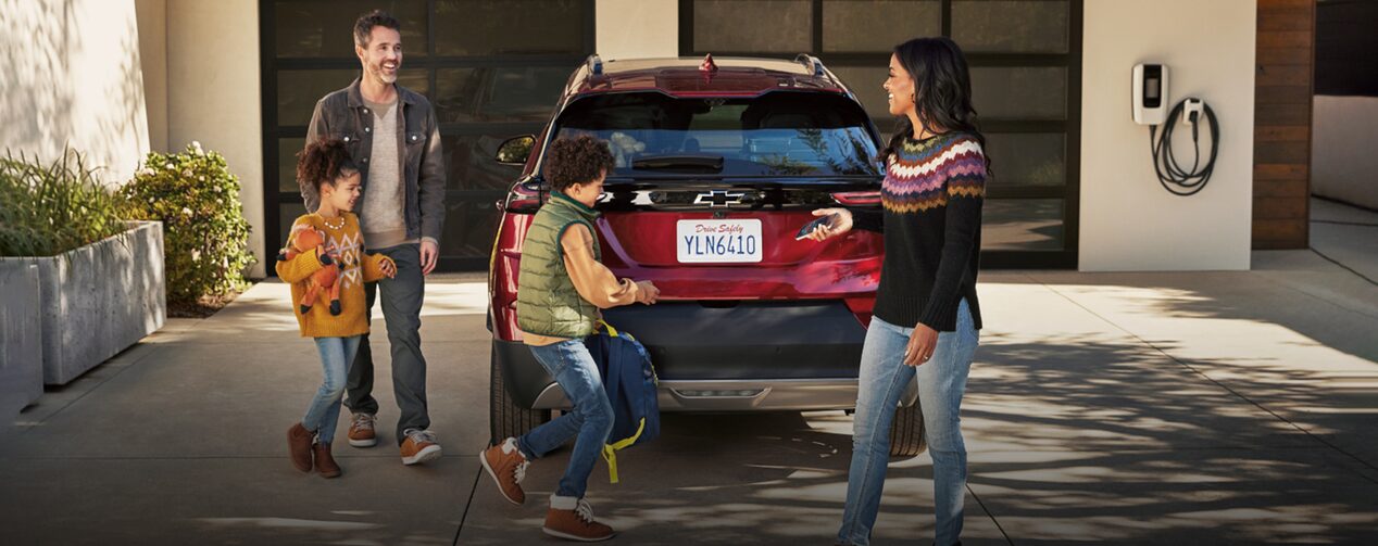 Family Loading the Back of their Vehicle for a Road Trip