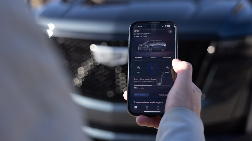 Justin using his myCadillac mobile app