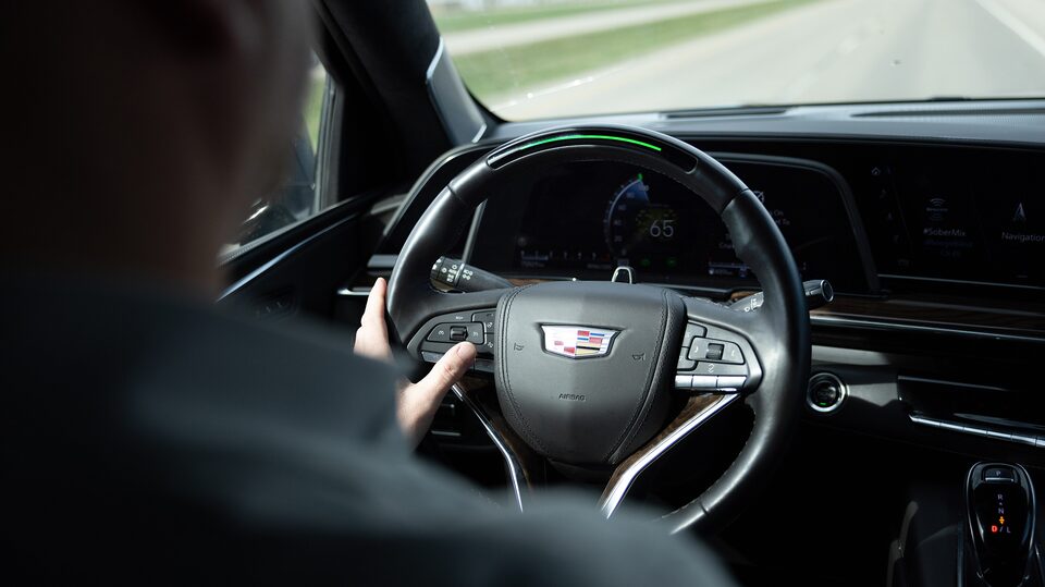 An over the shoulder view of the 2021 Cadillac Escalade steering wheel
