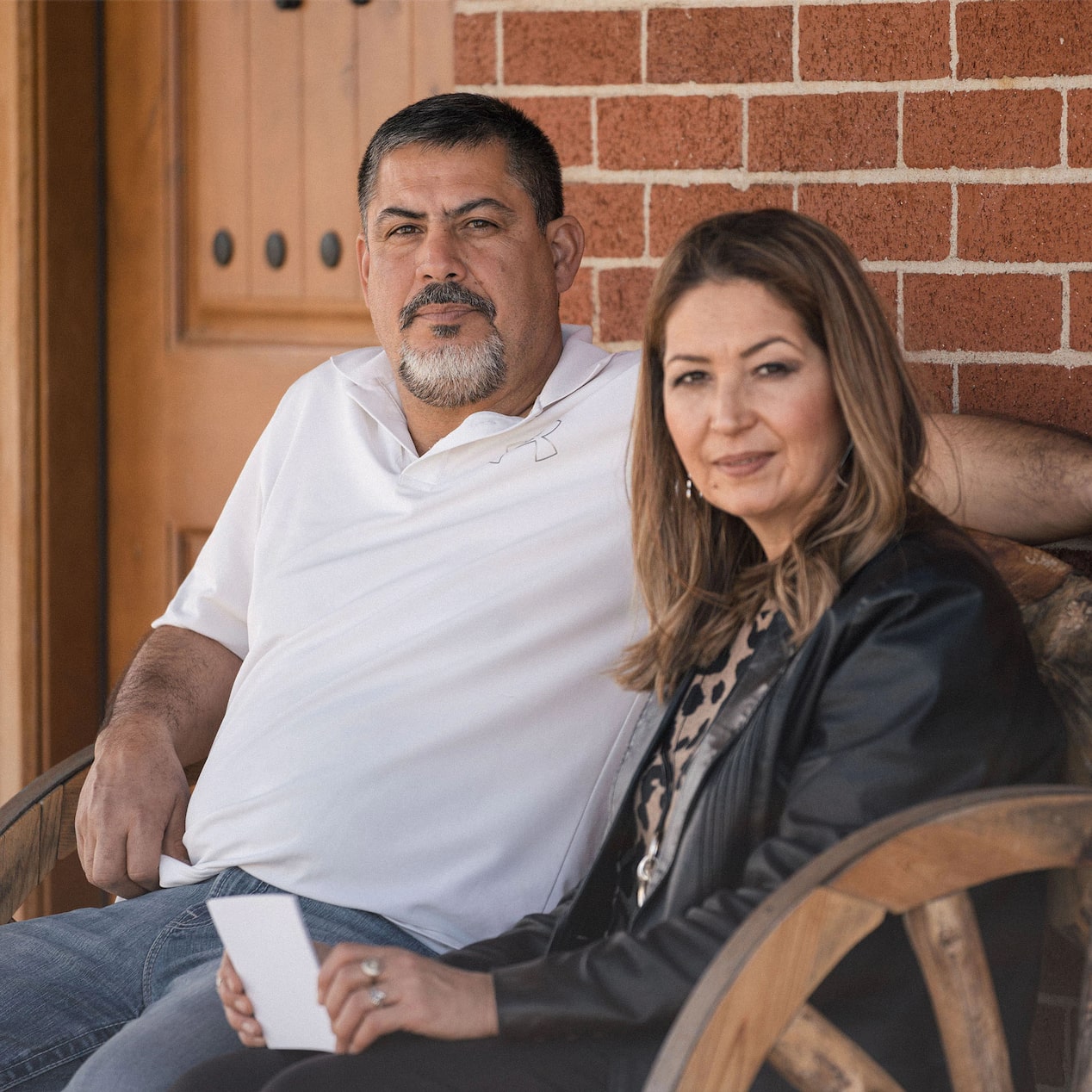 Couple Sitting on Front Porch