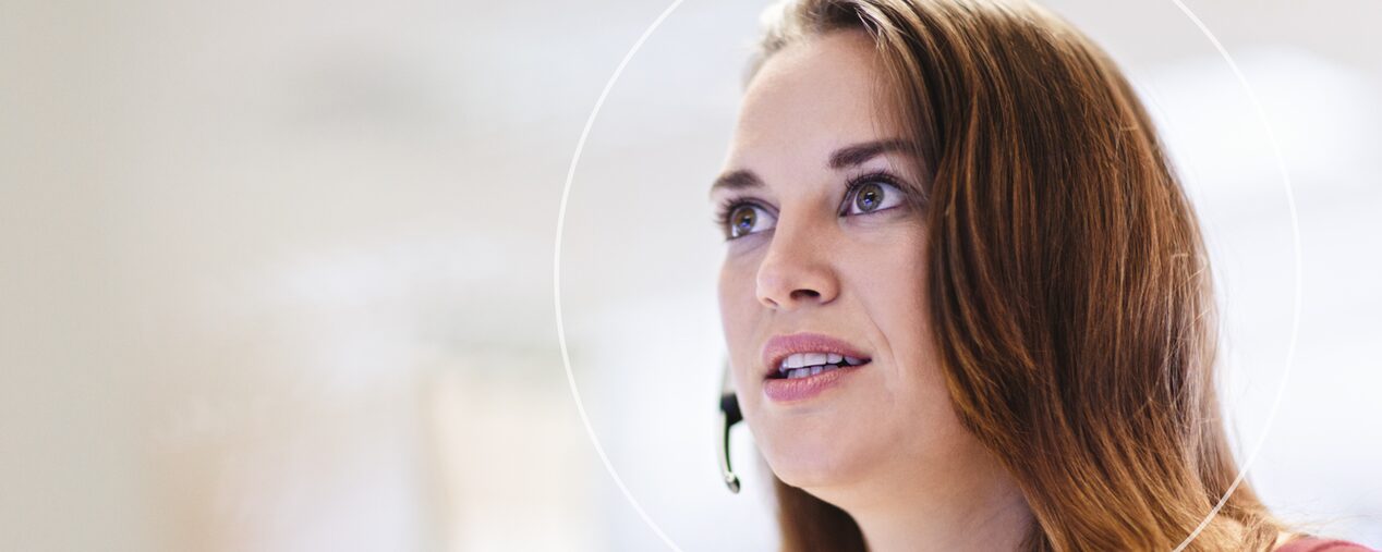 Close up of OnStar Advisor Speaking into her Headset