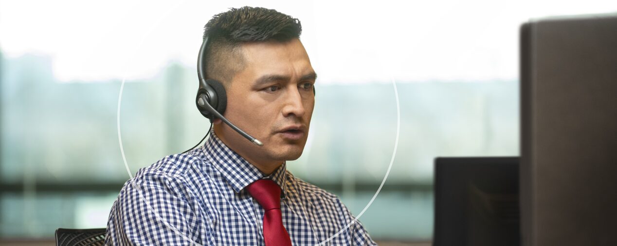 Male OnStar Advisor Speaking into Headset