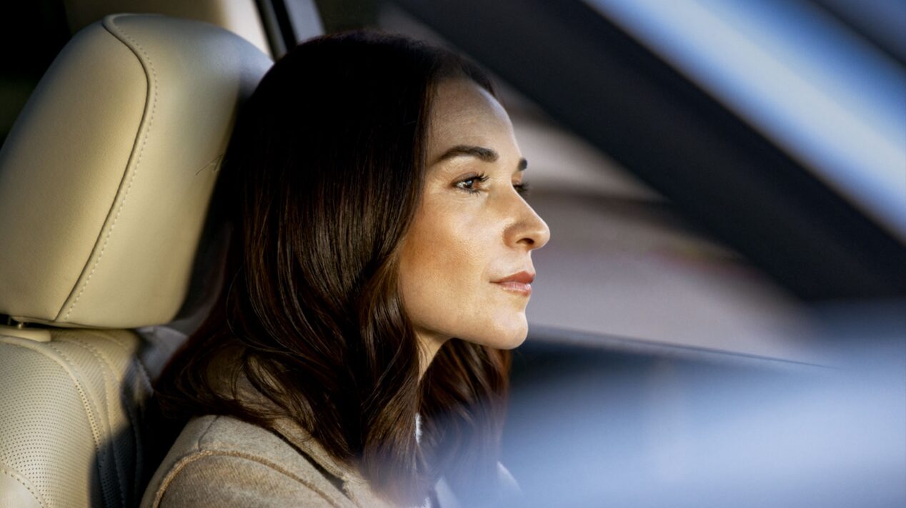 Close Up of Woman Driving and Paying Attention to the Road