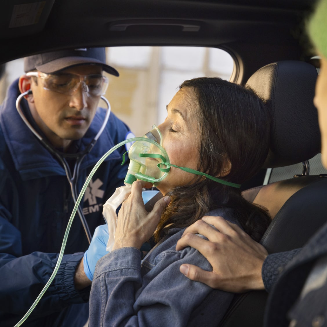 EMT Helping to Save Woman in Vehicle