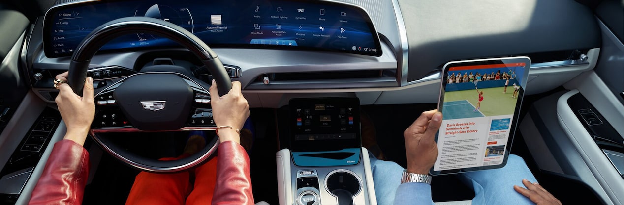 View of a vehicle's steering wheel and infotainment system