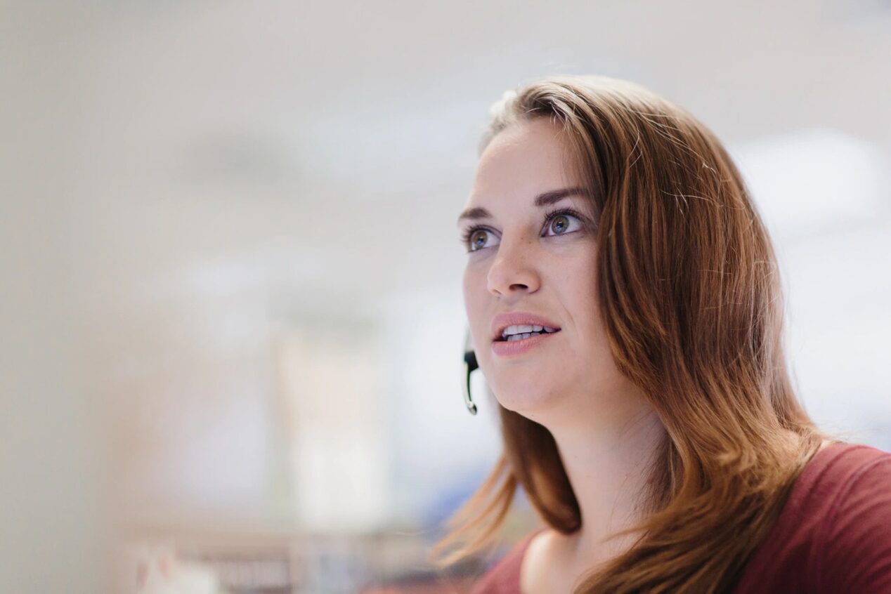 Female OnStar Advisor with Headset on